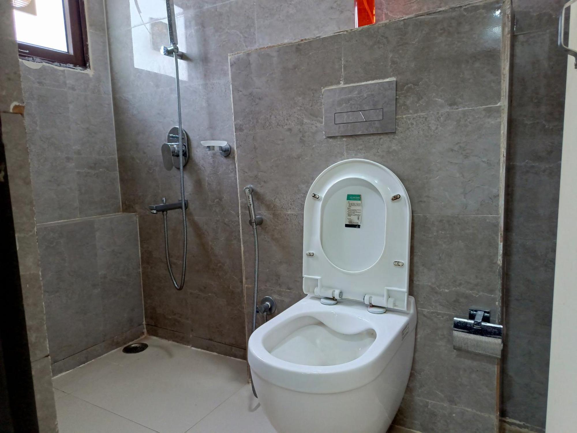 Sm Residency Hotel บูบันเนสชวาร์ ภายนอก รูปภาพ