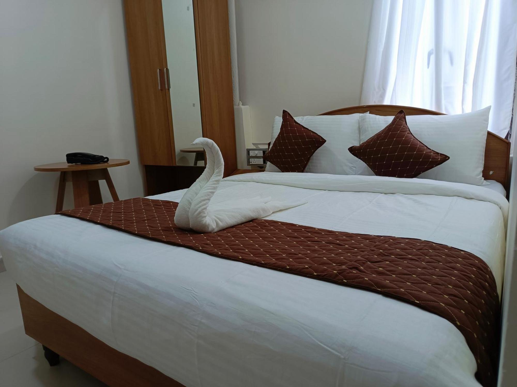 Sm Residency Hotel บูบันเนสชวาร์ ภายนอก รูปภาพ