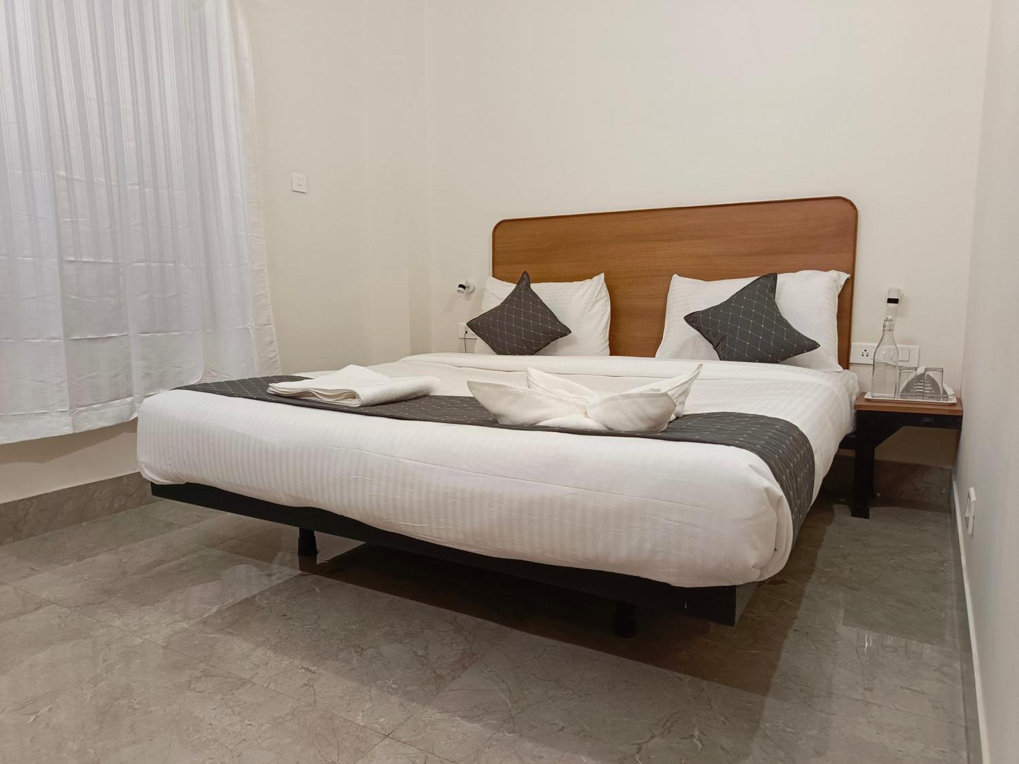 Sm Residency Hotel บูบันเนสชวาร์ ภายนอก รูปภาพ